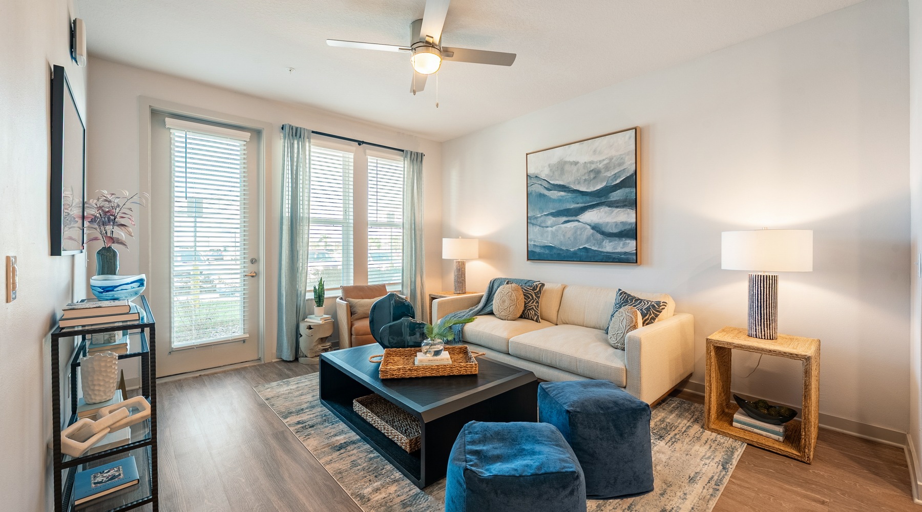 Bright open-concept living room at Madison Watergrass apartments in Wesley Chapel FL.