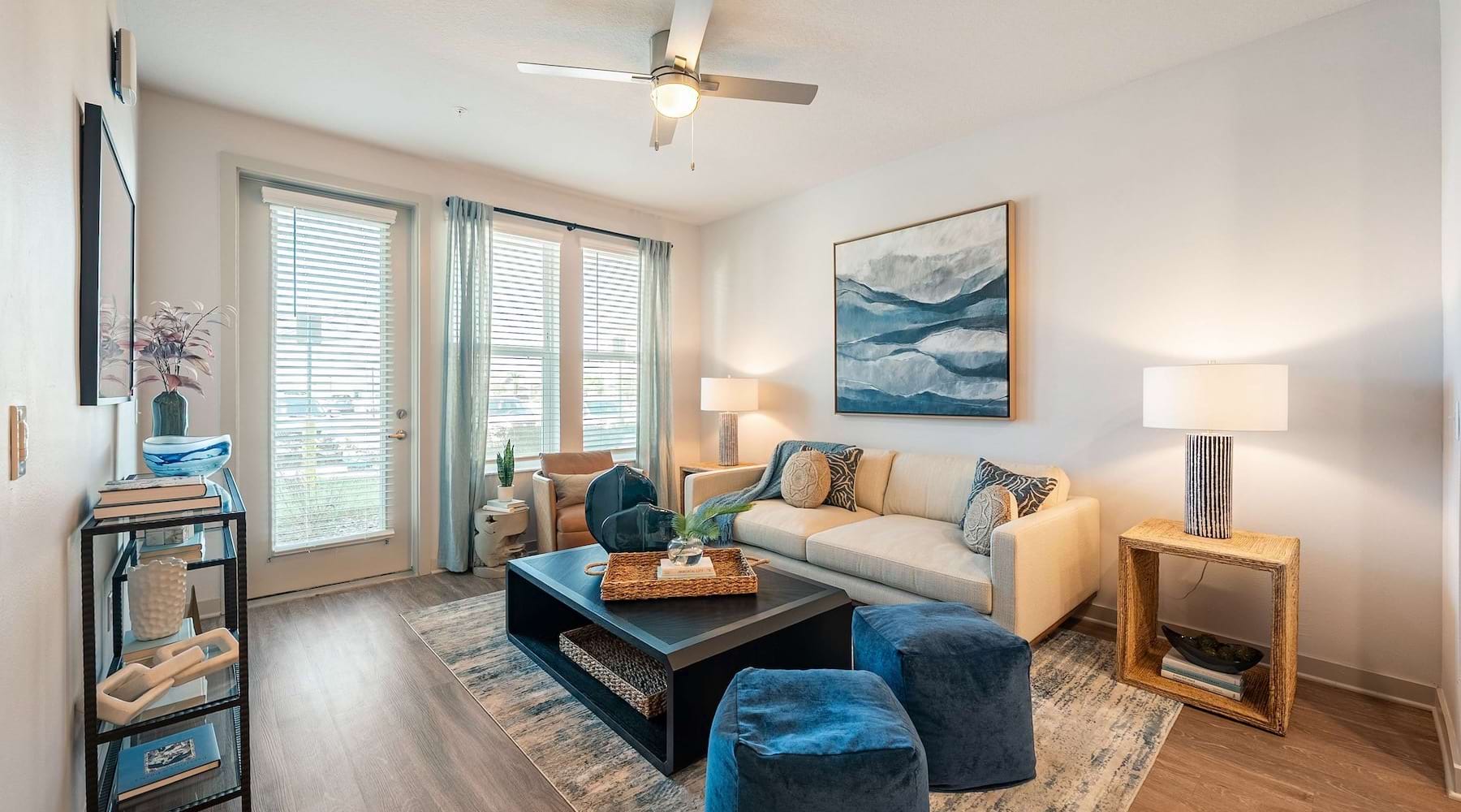 Bright open-concept living room at Madison Watergrass apartments in Wesley Chapel FL.